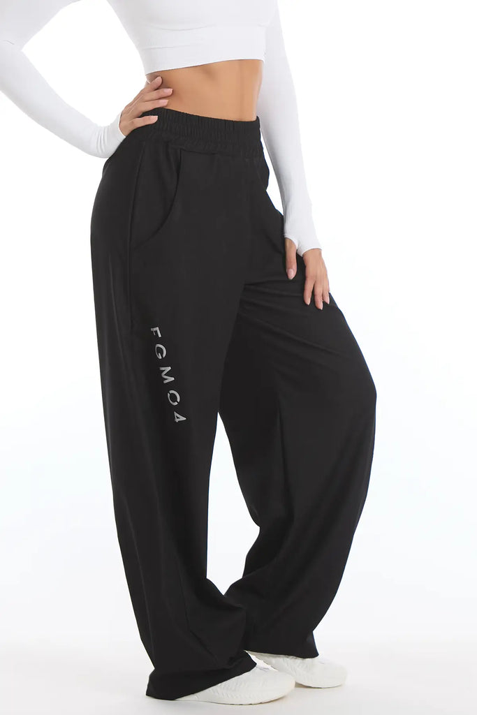 Juodos kelnės sportui moterims